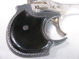 8863DerringerDM 101, 22 Mag. Made by High Standard, 3.5” Barrel, 5” overall length, Excellent bores, Nickel Finish barrel, black handle and grips, - 8 of 9