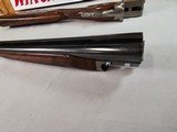 8870
Winchester 23 GRAND CANADIAN 20 gauge 26 barrels,
ic/mod, STRAIGHT GRIP,
14 1/4 LOP100% original, ejectors, vent rib, single select trigger, G - 11 of 17