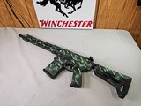 8874
Aero Precision Model M5 AR 308 / 7.62 Collapsible stock, has a worked lighter trigger, muzzle break, Picatinny rail system. Black and green cust