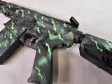 8874
Aero Precision Model M5 AR 308 / 7.62 Collapsible stock, has a worked lighter trigger, muzzle break, Picatinny rail system. Black and green cust - 3 of 12