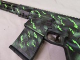 8874
Aero Precision Model M5 AR 308 / 7.62 Collapsible stock, has a worked lighter trigger, muzzle break, Picatinny rail system. Black and green cust - 4 of 12