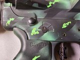 8874
Aero Precision Model M5 AR 308 / 7.62 Collapsible stock, has a worked lighter trigger, muzzle break, Picatinny rail system. Black and green cust - 9 of 12