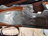 8877 Beretta Gardone VT 20 Gauge, (Jubilee) 3”, 28 “ Barrels, 6 screw in chokes, Beautiful hand engraved by Master Engraver C. Boniotii in 07-16-08. W - 12 of 25