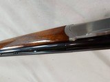 8883Ruger Red Label, 28 Gauge, 26” barrel, 2 screw in chokes, IC/Full, Kickez pad, 14 1/2 LOP, silver receiver. - 16 of 17