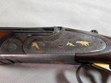 8881
Rizzini 600 NEA, 16 Gauge, Beautiful case color with gold bird inlays, KickEEE pad, has a weight in stock for kick, can be taken out. 28” Barrel - 6 of 21