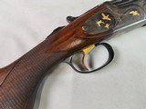 8881
Rizzini 600 NEA, 16 Gauge, Beautiful case color with gold bird inlays, KickEEE pad, has a weight in stock for kick, can be taken out. 28” Barrel - 16 of 21