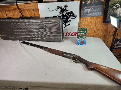 8881
Rizzini 600 NEA, 16 Gauge, Beautiful case color with gold bird inlays, KickEEE pad, has a weight in stock for kick, can be taken out. 28” Barrel