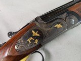 8881
Rizzini 600 NEA, 16 Gauge, Beautiful case color with gold bird inlays, KickEEE pad, has a weight in stock for kick, can be taken out. 28” Barrel - 15 of 21