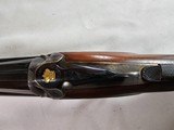 8881
Rizzini 600 NEA, 16 Gauge, Beautiful case color with gold bird inlays, KickEEE pad, has a weight in stock for kick, can be taken out. 28” Barrel - 11 of 21