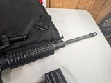 8882
DPMS A-15 223- NEW- Collapsible stock, Picatinny rail. 3
30 round magazines. In a canvas tactical soft case. One box of shells, Nikon M223- 2-4 - 4 of 16