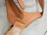 8885
Hand tooled leather Holster, 32 to 34 waist, made in Mexico, will take a 8 1/2 barrel. Light leather - 8 of 8