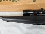8887Remington model 700 DM light Tactical Rifle, .308 WIN,Bolt action, 3 detachable mags, 20” Fluted Barrel. Opta 300 3-9x 42 scope .Black synth - 6 of 16