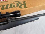 8887Remington model 700 DM light Tactical Rifle, .308 WIN,Bolt action, 3 detachable mags, 20” Fluted Barrel. Opta 300 3-9x 42 scope .Black synth - 11 of 16
