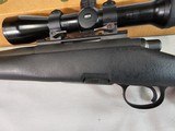 8887Remington model 700 DM light Tactical Rifle, .308 WIN,Bolt action, 3 detachable mags, 20” Fluted Barrel. Opta 300 3-9x 42 scope .Black synth - 5 of 16