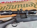 8887Remington model 700 DM light Tactical Rifle, .308 WIN,Bolt action, 3 detachable mags, 20” Fluted Barrel. Opta 300 3-9x 42 scope .Black synth - 10 of 16