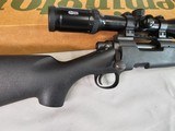 8887Remington model 700 DM light Tactical Rifle, .308 WIN,Bolt action, 3 detachable mags, 20” Fluted Barrel. Opta 300 3-9x 42 scope .Black synth - 9 of 16