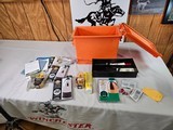 8909 Orange dry ammo box with black powder supplies.
Please see pictures that all that is included.
Bullets.. ect.