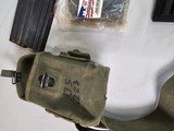 8915
223 Lot for Mini 14- 223 AR 2 rifle socks for the stock of the rifle to hold rifle shells. 2 US surplus magazine/ shell holders. 40 Rounds 5.56 - 12 of 12