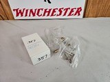 8916
357 Ammo Lot
49-357 Mag Winchester ammo Lead top. 5 rounds 357 Mag R.P. Copper and lead