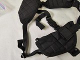 8919
Shoulder Harness black canvas, New. Conceal carry pistol with 2 mag holders. Adjustable. - 5 of 5