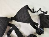 8919
Shoulder Harness black canvas, New. Conceal carry pistol with 2 mag holders. Adjustable. - 4 of 5