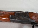 8930
Winchester 101 28 Gauge 28” barrels, 14 1/2 LOP, Pachmyer pad, vent rib, Brass bead, Mod/Full,
95% has some handling marks, great shooter! - 7 of 18