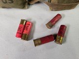 8934  12 Gauge shotgun shell lot in US army Pouch, 44 Miscellaneous 12 gauge shells, 4 older ones with paper shell, Winchester shells 2 3/4, - 2 of 7