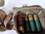 8934  12 Gauge shotgun shell lot in US army Pouch, 44 Miscellaneous 12 gauge shells, 4 older ones with paper shell, Winchester shells 2 3/4, - 3 of 7