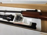 8935  Beeman Dual Caliber Air Rifle- 1000 FPS .177 barrel, 800 FPS .22 Cal Barrel, break action, with a 4x32 scope, model 1073, wood stock, in box lik - 5 of 8