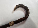 8939- Sword Cane- This antique can sword has AA polish Toledo Spanish metal, 1900 is marked on it as well. Had a crooked handle and a bamboo sheath fo - 8 of 17