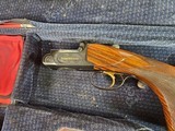 8941
Perazzi MX 2000, Trap Gun, 12 gauge, fixed full choke, 34 Inch barrel, ported bottom single barrel, high rib, adjustable comb and butt, AA+ fanc - 10 of 25