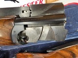 8941
Perazzi MX 2000, Trap Gun, 12 gauge, fixed full choke, 34 Inch barrel, ported bottom single barrel, high rib, adjustable comb and butt, AA+ fanc - 17 of 25