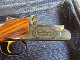 8941
Perazzi MX 2000, Trap Gun, 12 gauge, fixed full choke, 34 Inch barrel, ported bottom single barrel, high rib, adjustable comb and butt, AA+ fanc - 4 of 25