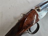 8950
Winchester Model 23 Pigeon 12 Gauge, 28” Barrels, MOD/FULL, 90% condition chips in stock, ejectors, vent rib, 2 white beads, Winchester butt pla - 20 of 20