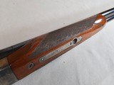 8950
Winchester Model 23 Pigeon 12 Gauge, 28” Barrels, MOD/FULL, 90% condition chips in stock, ejectors, vent rib, 2 white beads, Winchester butt pla - 19 of 20