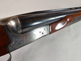 8950
Winchester Model 23 Pigeon 12 Gauge, 28” Barrels, MOD/FULL, 90% condition chips in stock, ejectors, vent rib, 2 white beads, Winchester butt pla - 12 of 20