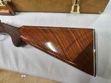 8954
Winchester 23 Pigeon XTR 20 Gauge, 3”, Round knob, Ejectors, 28” Barrels, 14 1/4 LOP, MOD/FULL, Beautiful stripped wood, Yellow trunk style case - 2 of 7