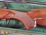 8957
Winchester 101 XTR Lightweight 12 Gauge, 27” Barrel, screw in chokes, Comes with 5 flush win chokes, 14 1/4 LOP, Pistol Grip, Vent Rib, LIKE NEW - 4 of 25