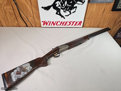 8962 American Arms Silver Hunter 12 gauge 3 inch 26 inch barrels 2 screw in chokes mod full, extractors single select trigger Schnabel forend. gold tr