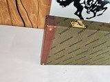 8965—Winchester Green with red interior trunk style shot gun case. Will fit a 101 or model 23. Was for a Model 23 classic 20 GA. Come with the origina - 9 of 18