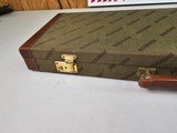8965—Winchester Green with red interior trunk style shot gun case. Will fit a 101 or model 23. Was for a Model 23 classic 20 GA. Come with the origina - 6 of 18