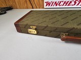 8965—Winchester Green with red interior trunk style shot gun case. Will fit a 101 or model 23. Was for a Model 23 classic 20 GA. Come with the origina - 3 of 18