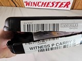 8982
Tanfoglio EAA Witness P carry 9mm, on magazine, like new light or laser mount on the bottom, in box with paperwork. - 14 of 14