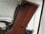 8984
High Standard Trophy Military auto target pistol, .22 LR, 5 1/2 barrel, 10 shot, NIB with paperwork.
more pictures at dawsonsdoubles.com - 4 of 14