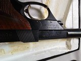 8984
High Standard Trophy Military auto target pistol, .22 LR, 5 1/2 barrel, 10 shot, NIB with paperwork.
more pictures at dawsonsdoubles.com - 9 of 14