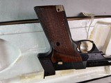 8984
High Standard Trophy Military auto target pistol, .22 LR, 5 1/2 barrel, 10 shot, NIB with paperwork.
more pictures at dawsonsdoubles.com - 7 of 14