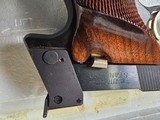 8984
High Standard Trophy Military auto target pistol, .22 LR, 5 1/2 barrel, 10 shot, NIB with paperwork.
more pictures at dawsonsdoubles.com - 5 of 14