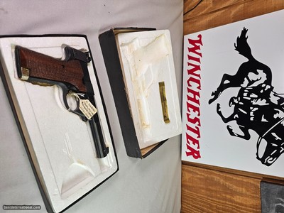 8984
High Standard Trophy Military auto target pistol, .22 LR, 5 1/2 barrel, 10 shot, NIB with paperwork.
more pictures at dawsonsdoubles.com