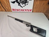 9006
Sporting Arms Snake Charmer II, 410 Gauge, Thumb Hole Stock, 18” Barrel,
Stainless, Black composite, Made in Texas, locks up tight. More pictur