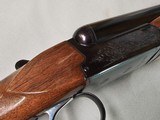 9008
Browning BSS 12 Gauge, 28” Barrels, Mod/Full, 1971 MFG, 2 Metal Beads, Early good one, Extractors, single non selective trigger, Pistol Grip, 14 - 17 of 20